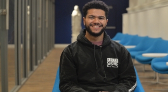 Two priest sitting at a table reading